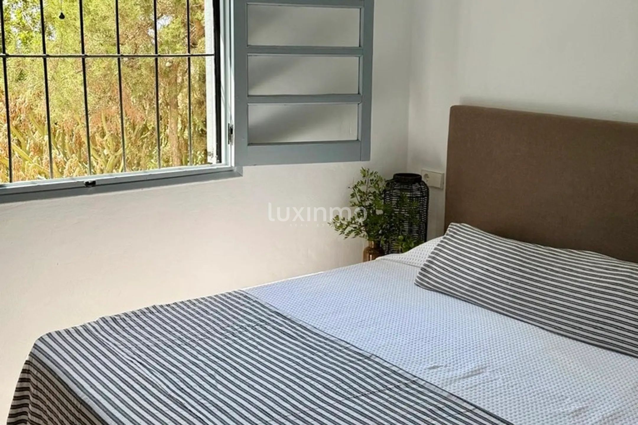 A Charming Ibicenco Retreat with Sea and Sunset Views in Cala Gració — photo 13