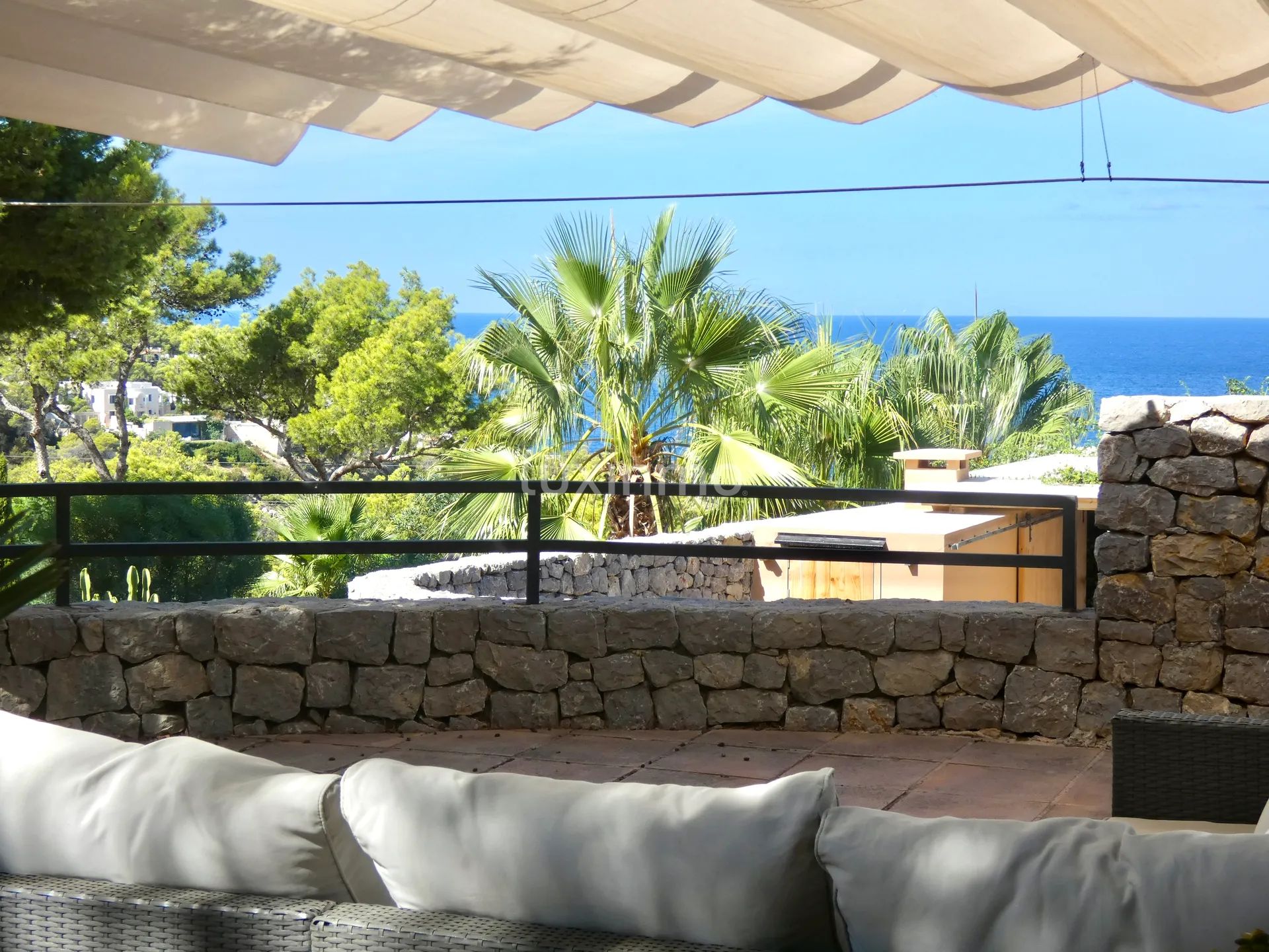 Charming semi-detached house with sea views in Cala Tarida — photo 3