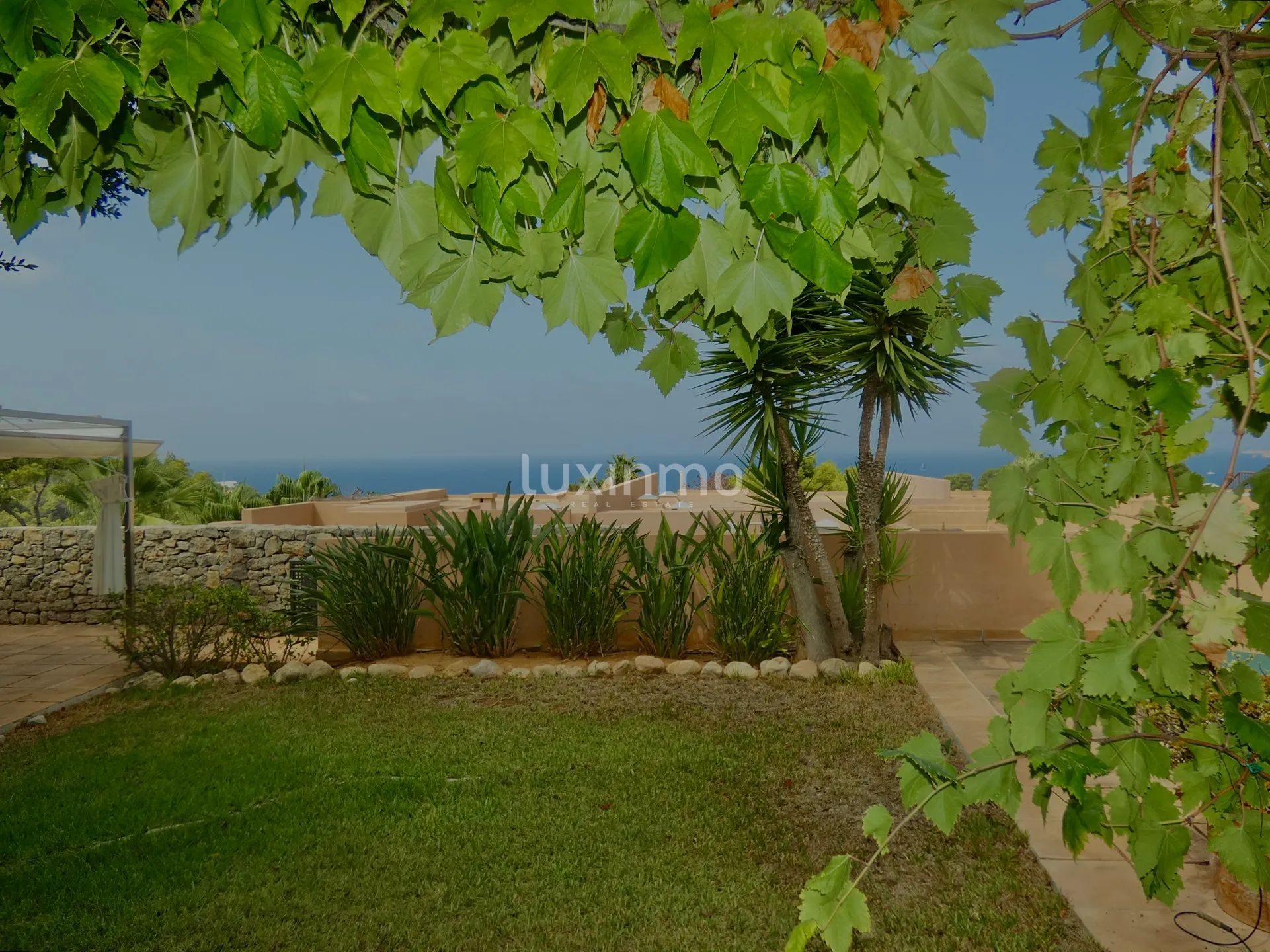 Charming semi-detached house with sea views in Cala Tarida — photo 2