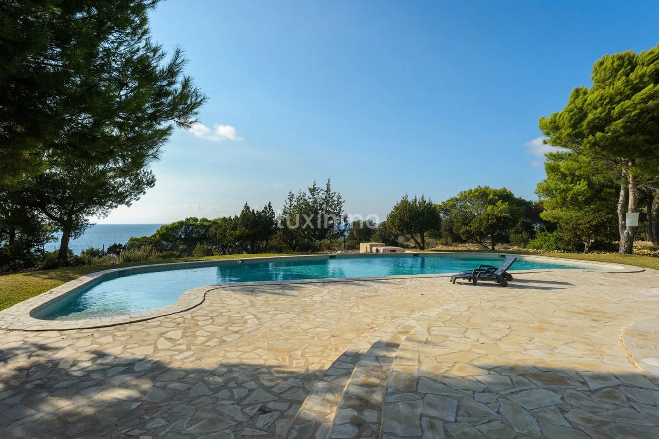 Charming mediterranean semi-detached house with sunset views in Cala Tarida — photo 29