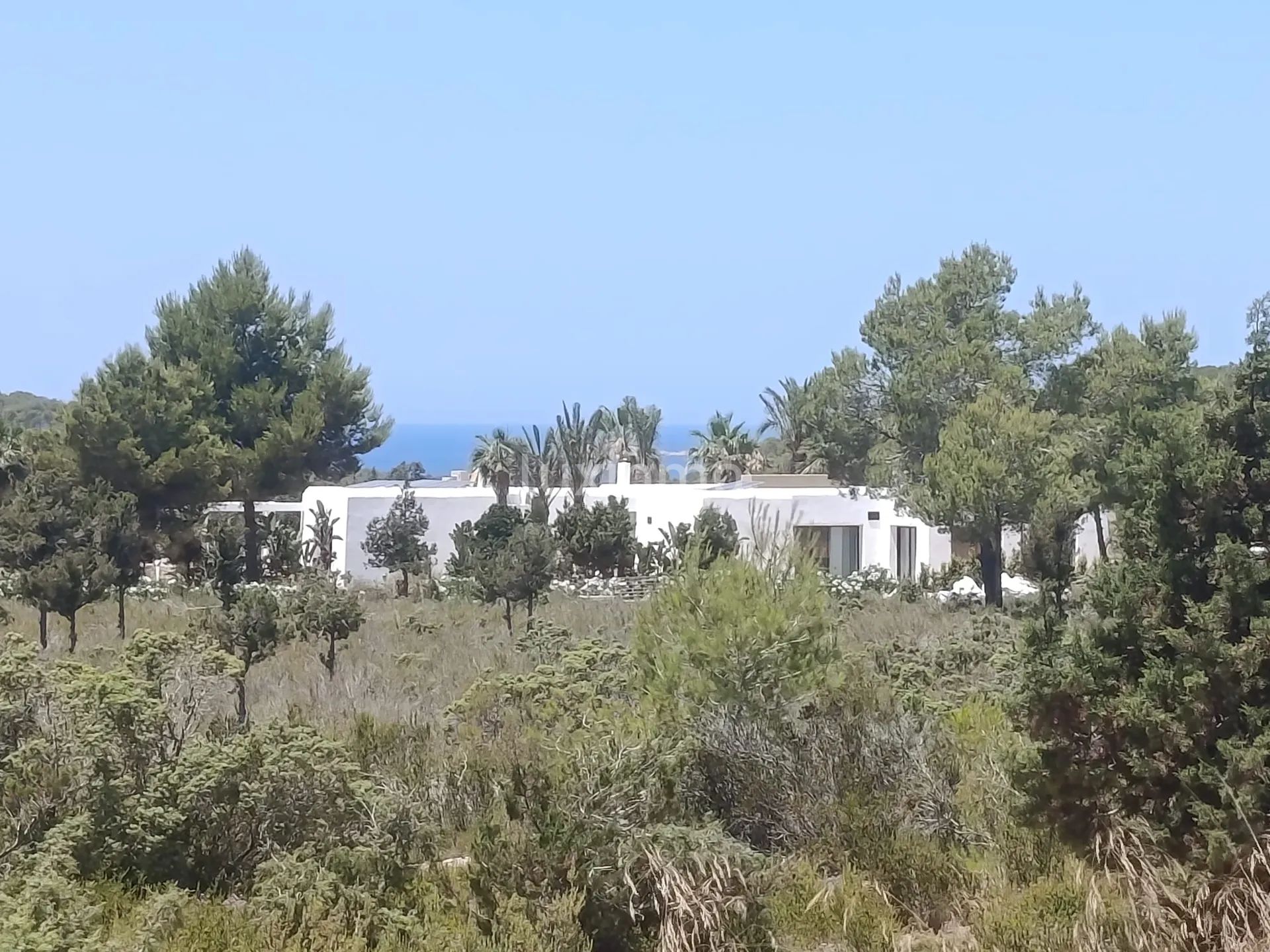 Espléndida villa nueva de estilo ibicenco en Cala Compta con vistas al mar